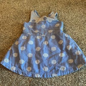 Adorable dress with peekaboo back.